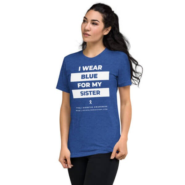 Girl wearing "I wear blue for my sister" shirt for Type 1 Diabetes Awareness